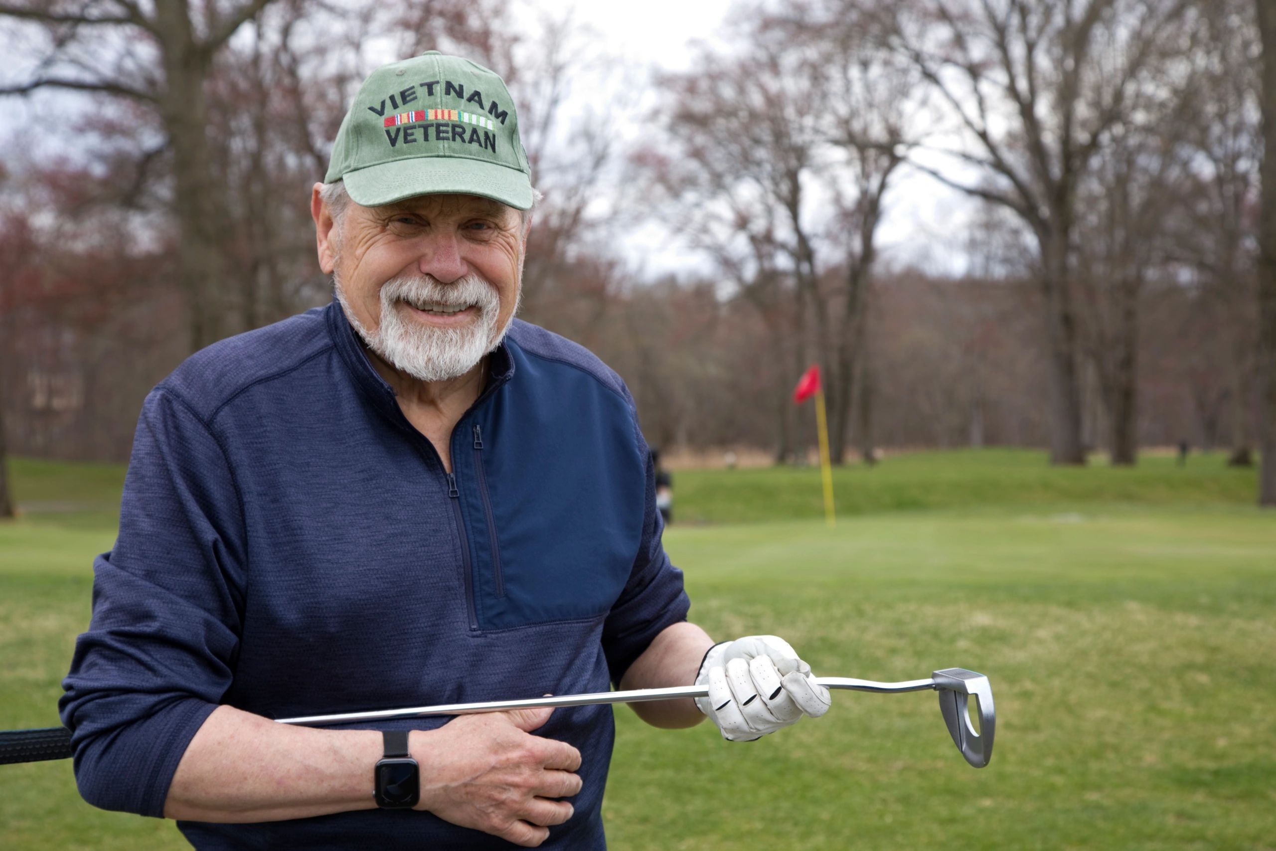 veteran athlete using golf training aid